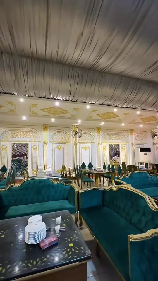 Film panning across lounge seating in the hall